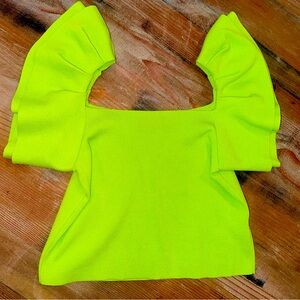 Super cute, never worn, ruffle sleeve shirt.